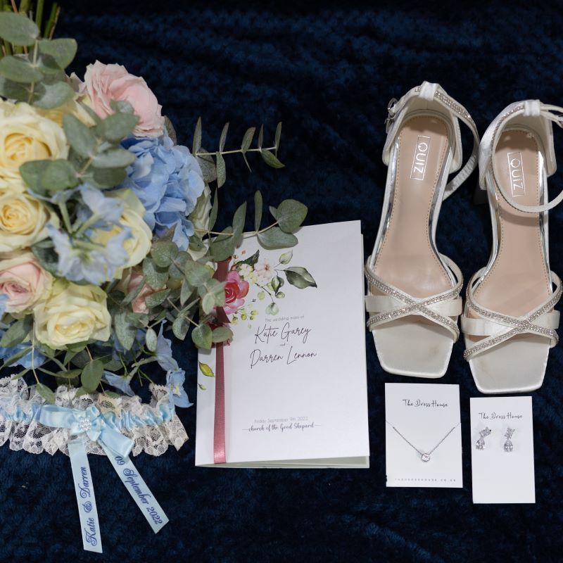 Lennon Garey Mass Booklet Wedding Mass Booklet pictured with Shoes and Button Flowers